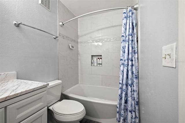 full bathroom featuring vanity, toilet, and shower / bathtub combination with curtain