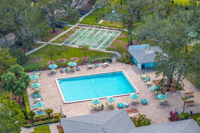 view of swimming pool featuring a patio area