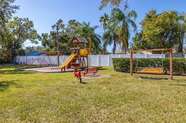 view of playground featuring a yard