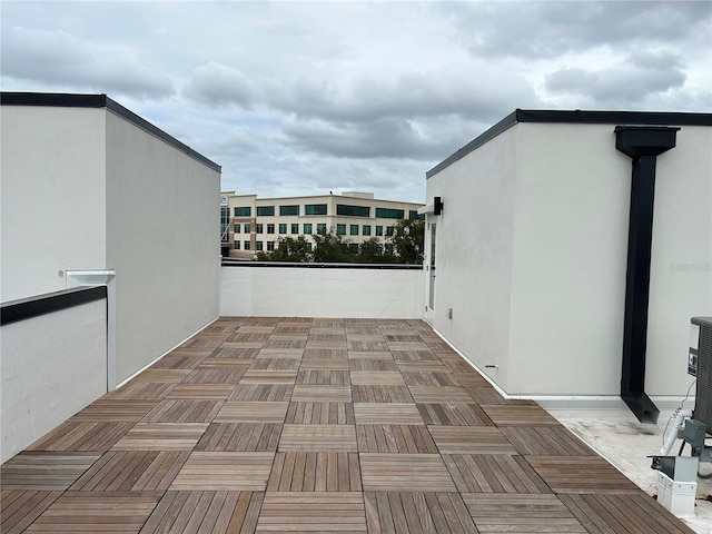 view of patio featuring a balcony