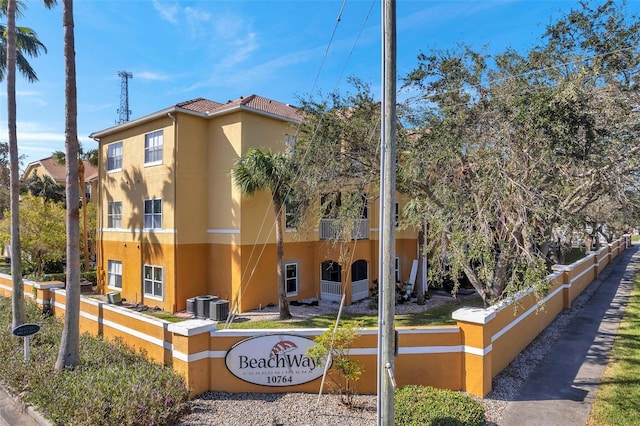 view of building exterior with cooling unit