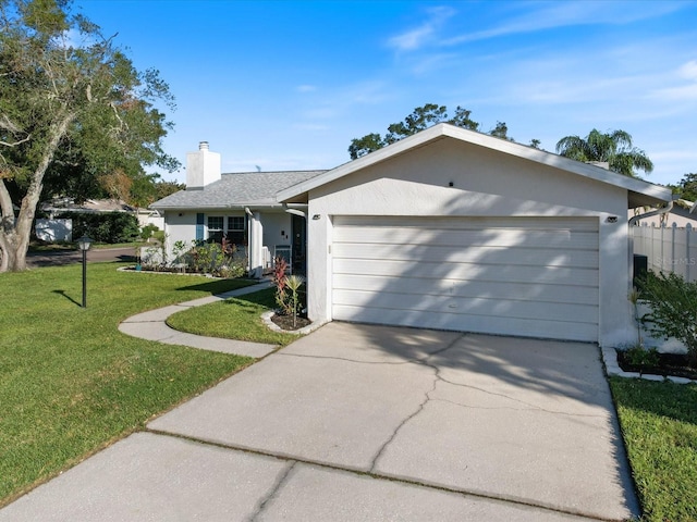 ranch-style house with a front yard and a garage