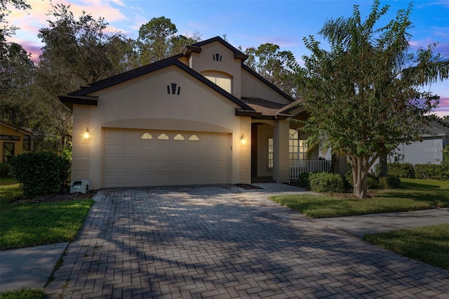 view of front of home with a garage