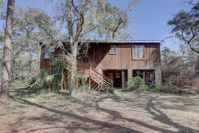 view of front of house with stairway