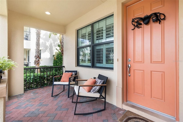 doorway to property with a porch