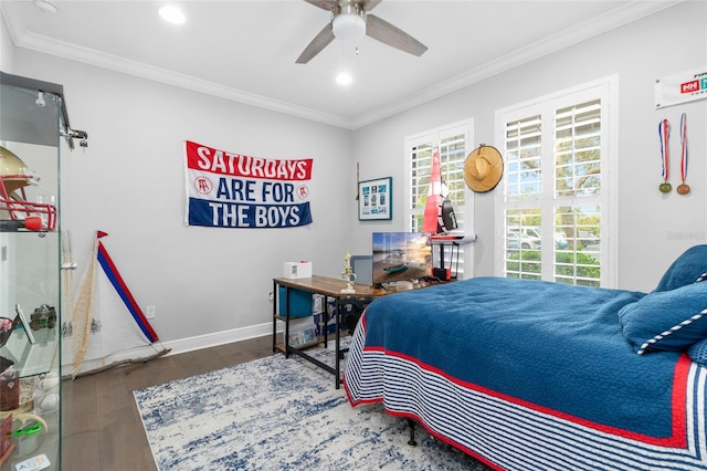 bedroom featuring ornamental molding, dark wood-type flooring, and ceiling fan