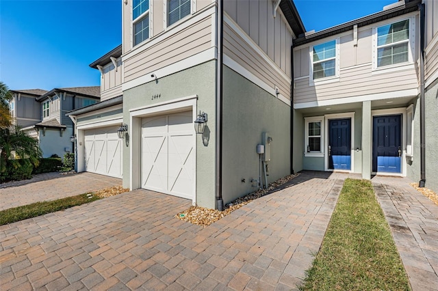 view of property exterior featuring a garage