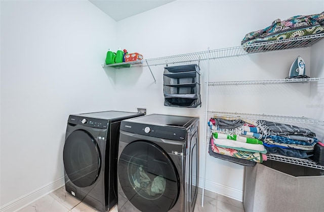 washroom with separate washer and dryer