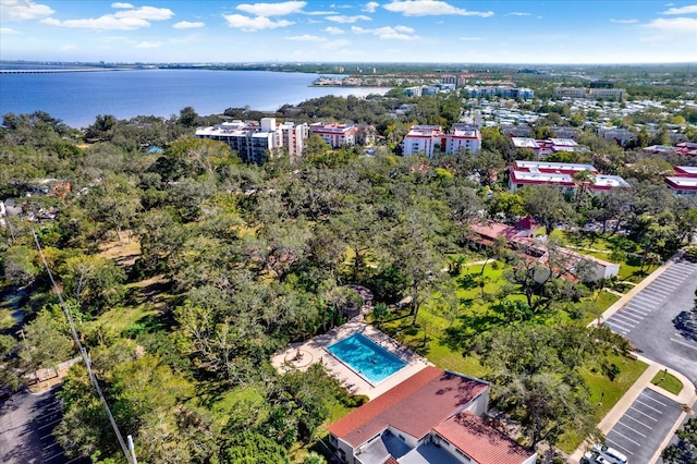 birds eye view of property featuring a water view