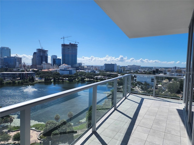 balcony featuring a water view