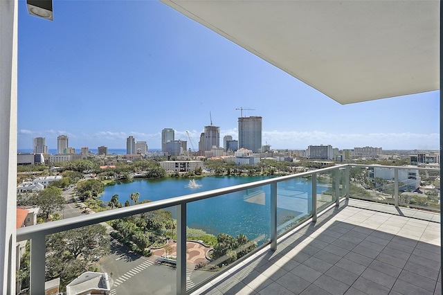 balcony featuring a water view