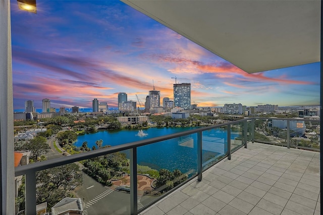 balcony at dusk with a water view