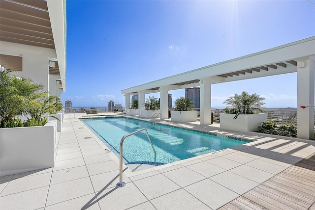 view of swimming pool featuring a patio