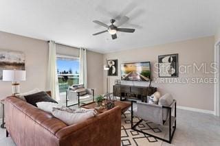 living room with ceiling fan