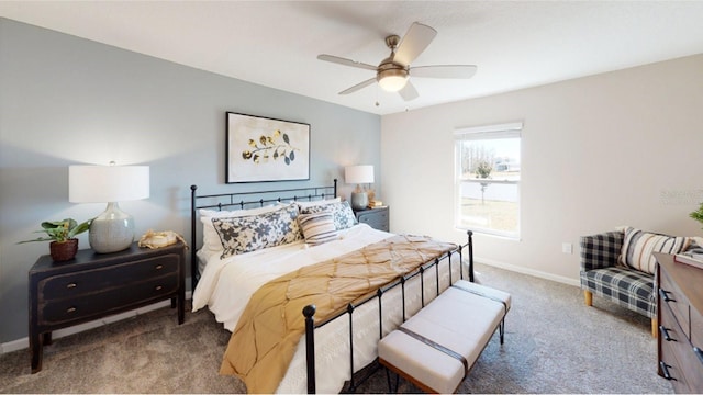 bedroom with ceiling fan and light colored carpet