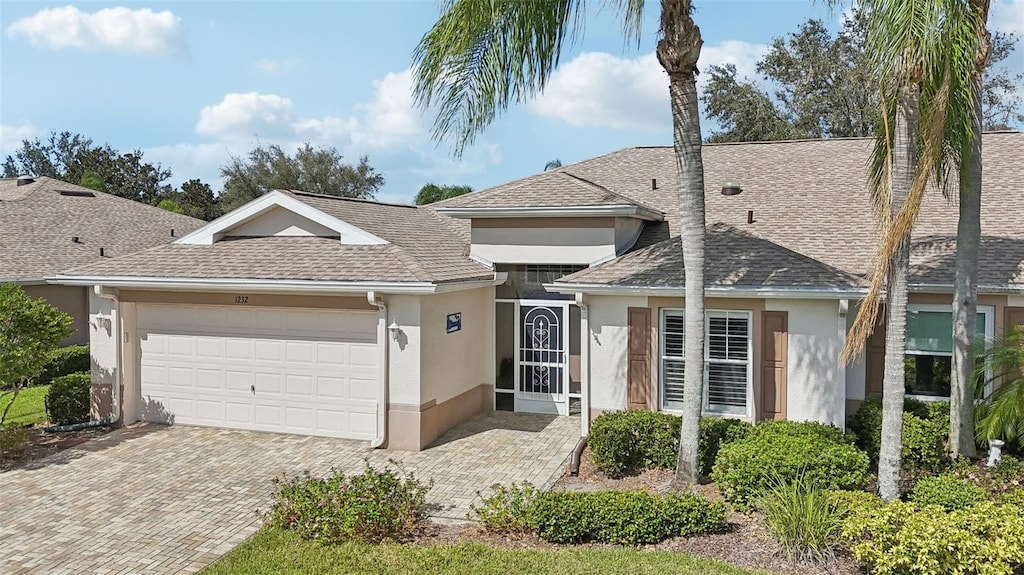 view of front of home with a garage