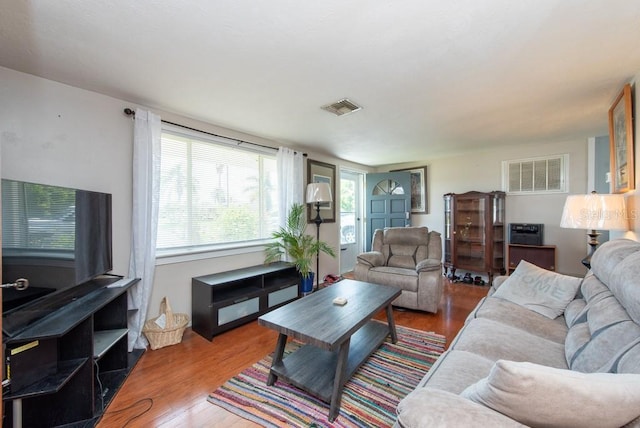 living room with hardwood / wood-style flooring