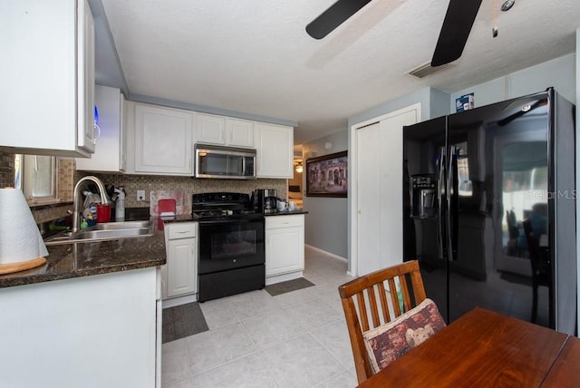 kitchen with tasteful backsplash, black appliances, sink, ceiling fan, and white cabinets