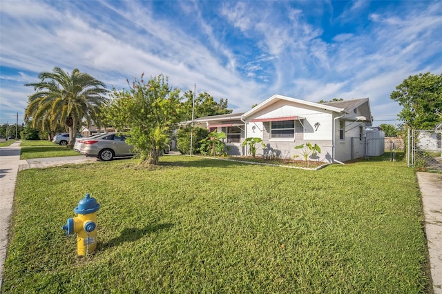 ranch-style house with a front yard