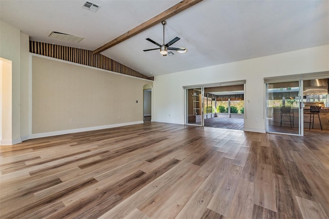 unfurnished living room with beamed ceiling, hardwood / wood-style floors, high vaulted ceiling, and ceiling fan