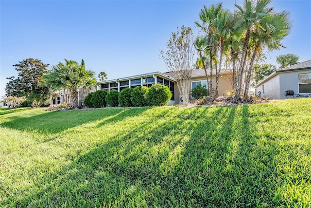 single story home with a front yard