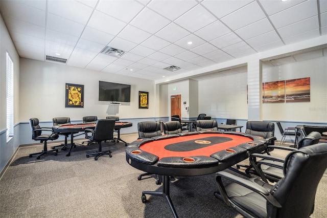 carpeted office featuring a paneled ceiling