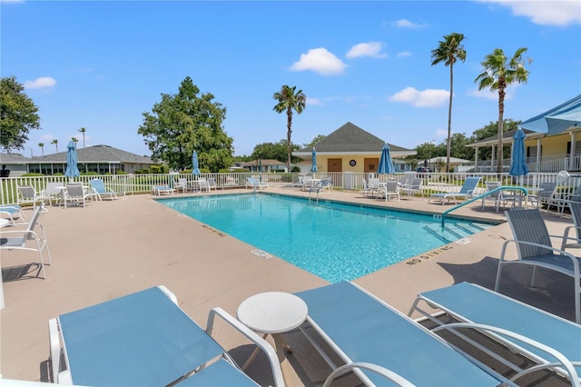 view of swimming pool with a patio