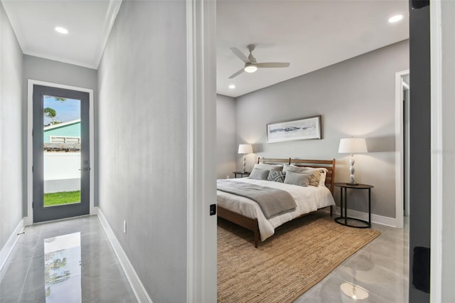 bedroom with ceiling fan and crown molding