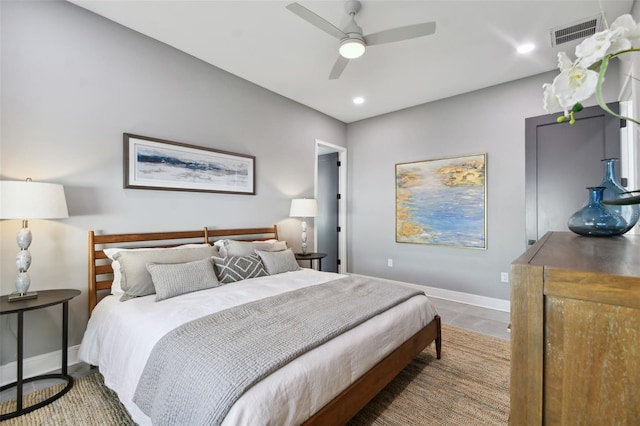 tiled bedroom with ceiling fan