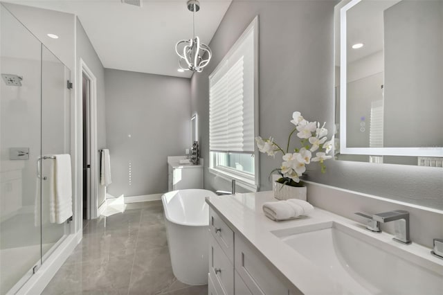 bathroom featuring tile patterned flooring, vanity, a notable chandelier, and shower with separate bathtub