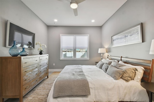 bedroom featuring wood-type flooring and ceiling fan