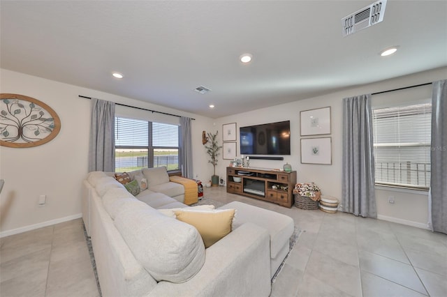 living room featuring light tile patterned floors