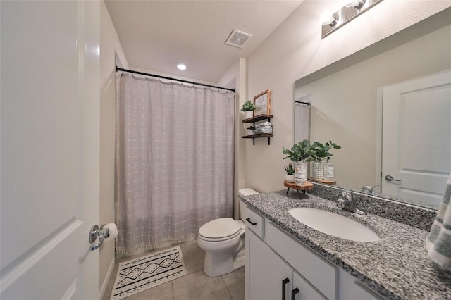 full bathroom with vanity, toilet, shower / bathtub combination with curtain, and tile patterned flooring