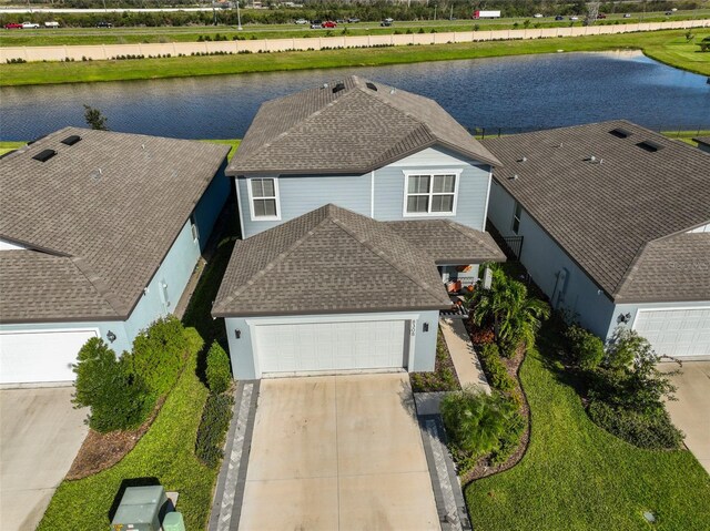 drone / aerial view featuring a water view