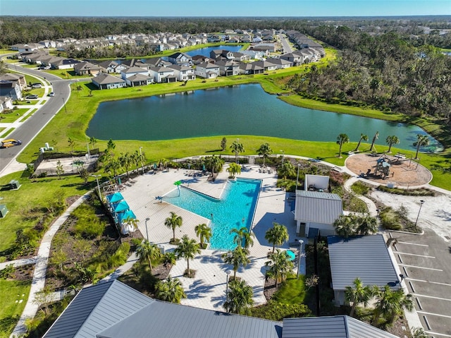 drone / aerial view with a water view