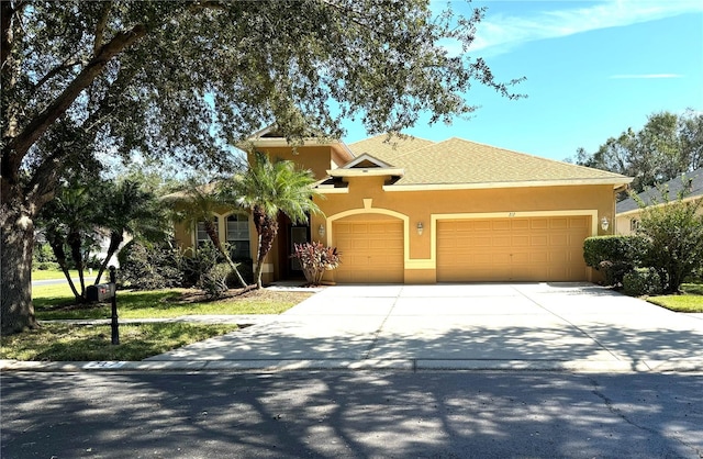 view of front of home with a garage