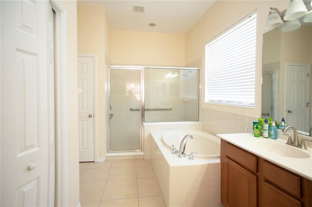 bathroom featuring vanity, tile patterned floors, and independent shower and bath