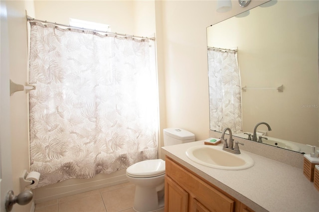 full bathroom with vanity, shower / tub combo with curtain, toilet, and tile patterned floors