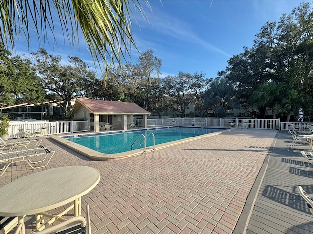 view of pool with a patio area