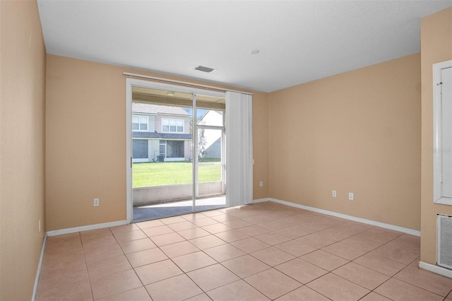 view of tiled spare room