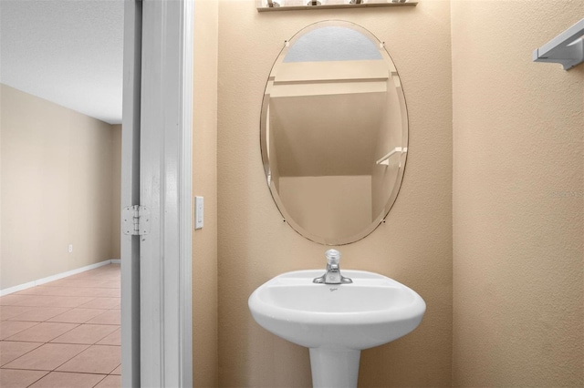 bathroom featuring tile patterned flooring