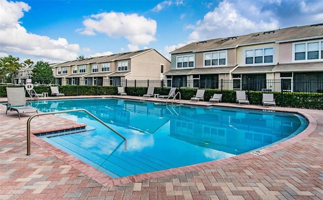 view of pool featuring a patio area