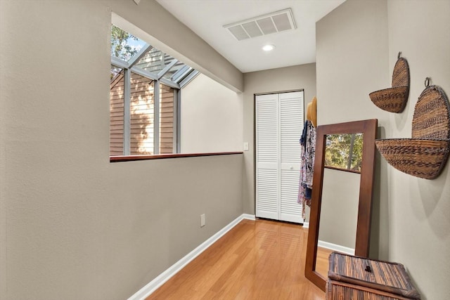 hallway featuring light hardwood / wood-style floors