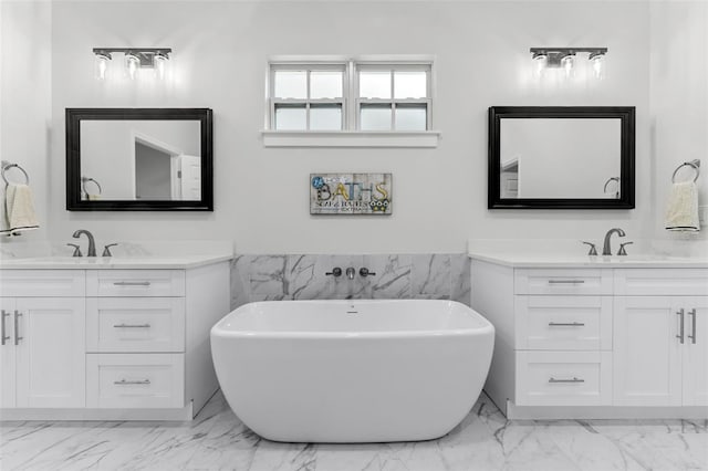 bathroom with vanity, tile walls, and a washtub