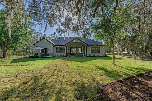 view of front of home with a front lawn