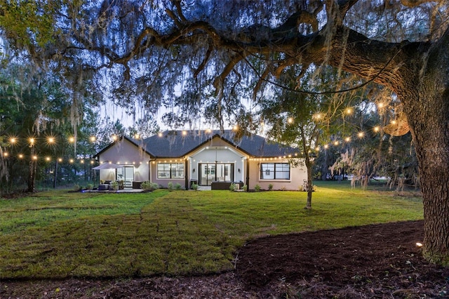 view of front of home with a front yard