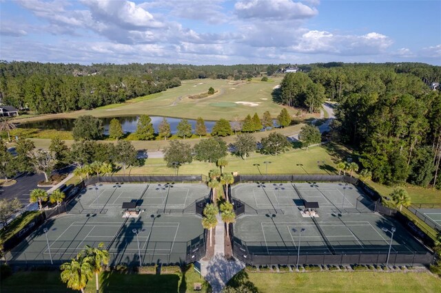 4586 Hickory Oak Dr, Brooksville, FL 34601 - aerial view of property and surrounding area featuring a large body of water, a local golf course, and a heavily wooded area
