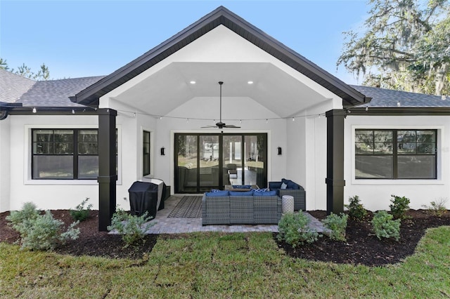 4586 Hickory Oak Dr, Brooksville, FL 34601 - rear view of house with an outdoor living space, ceiling fan, a shingled roof, and stucco siding