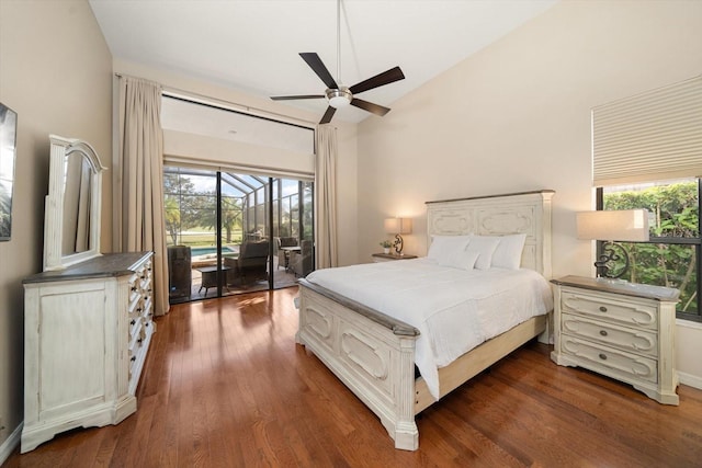 bedroom with ceiling fan, access to exterior, multiple windows, and dark hardwood / wood-style flooring