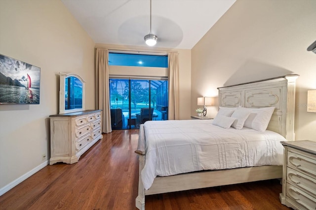 bedroom featuring access to outside, dark wood-type flooring, and ceiling fan